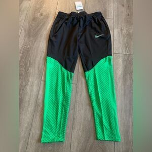 Nike woman’s soccer pants very beautiful green and black colors